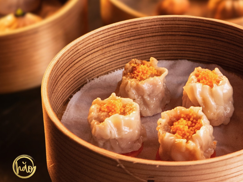 Siomai dim sum close-up with tobiko garnish